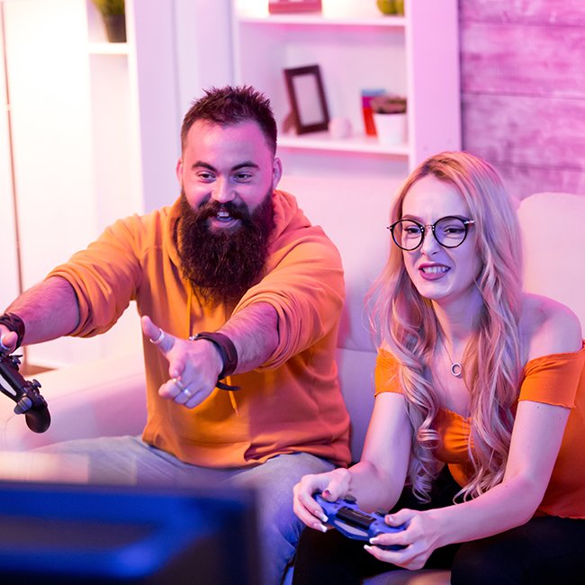 Couple enjoy gaming online